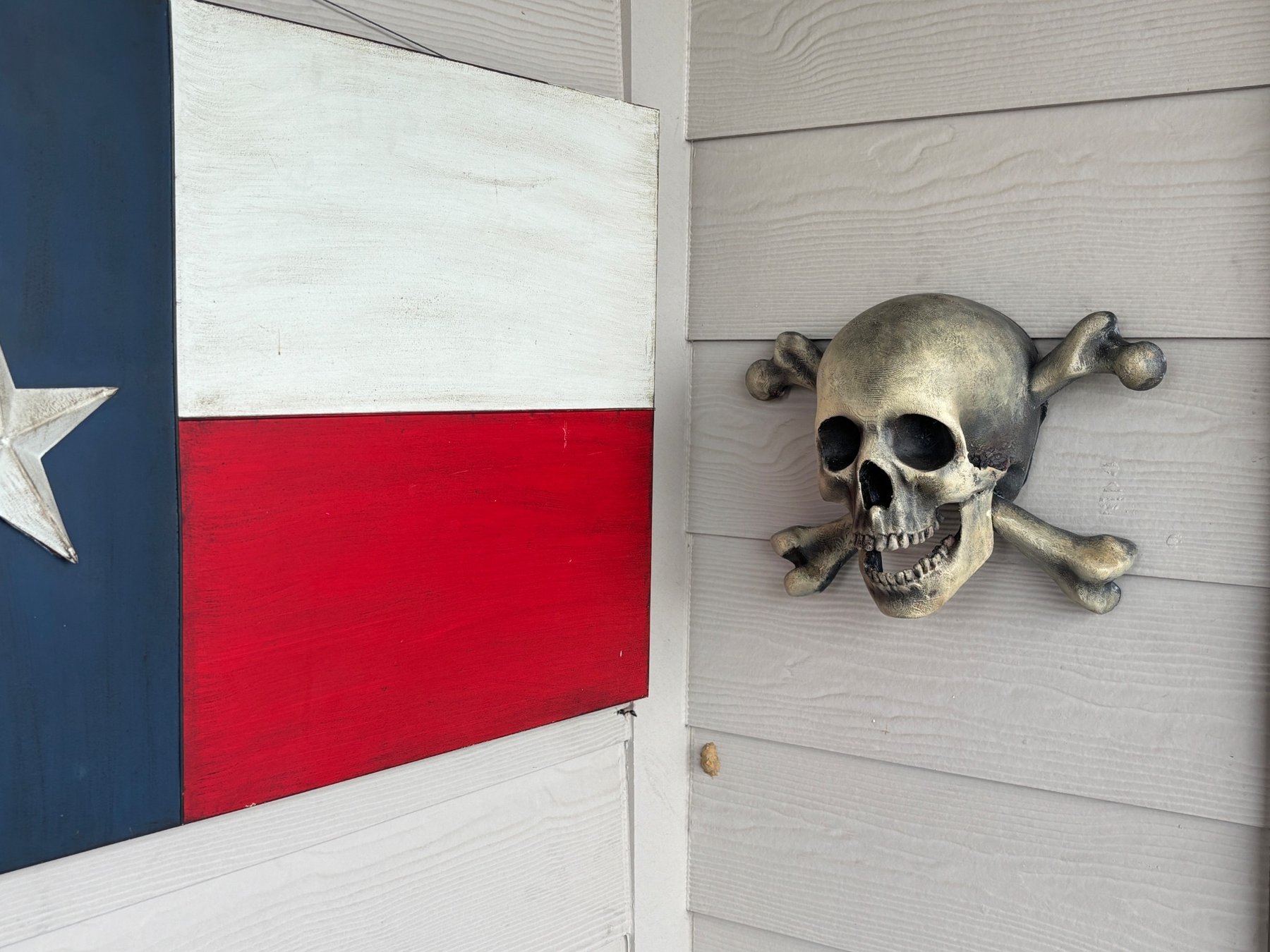 Jolly Roger wall relic mounted outdoors