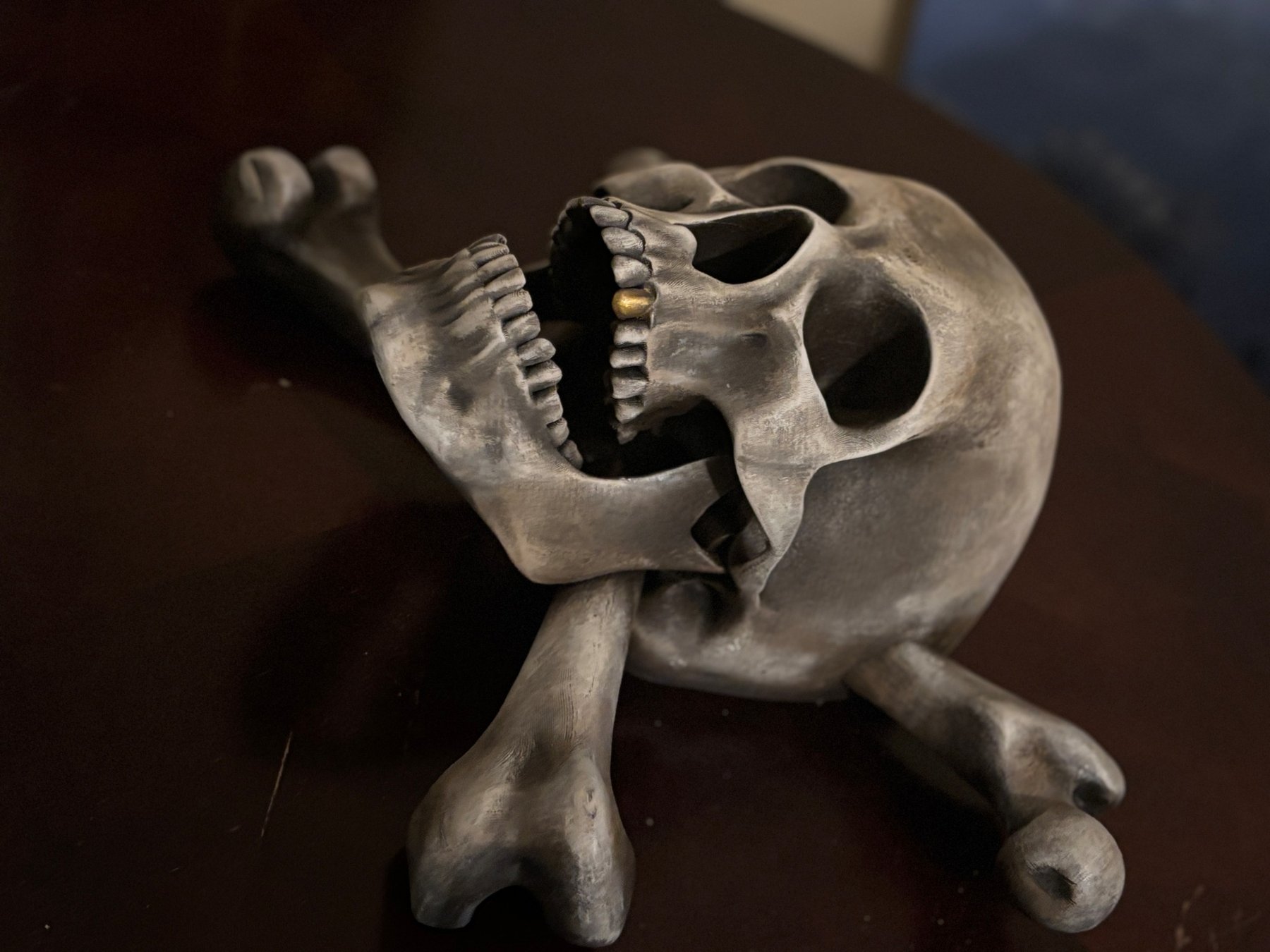 Jolly Roger skull and crossbones with gold tooth